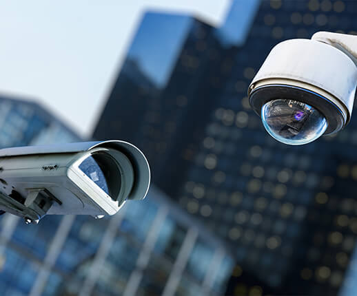 Security Cameras with buildings behind - Protection Solutions